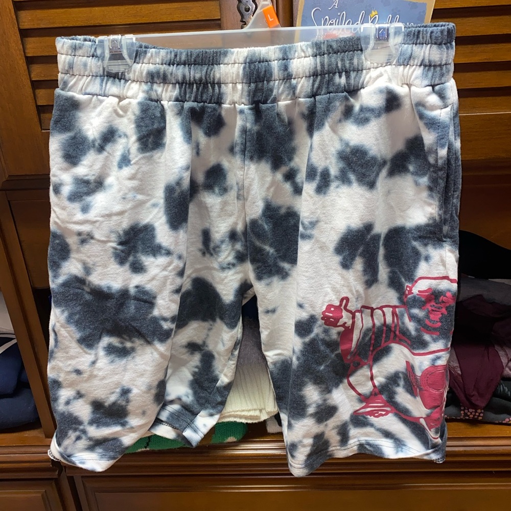 White and Black Tie-Dye True Religion shorts with big red budda logo